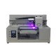 A2 UV Printer producing embossed glossy graphics on wood and glass